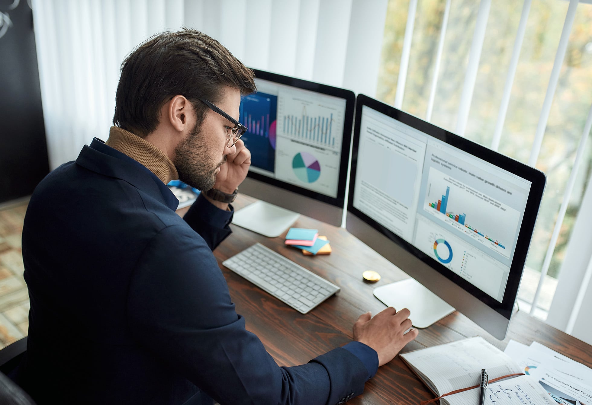 Business Professional Sitting at a desk working.